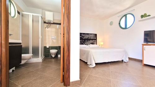 Koupelna v ubytování Ara Inn Comfort Suites