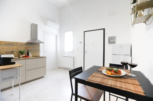 Kuchyň nebo kuchyňský kout v ubytování Elegante Bilocale con Giardino
