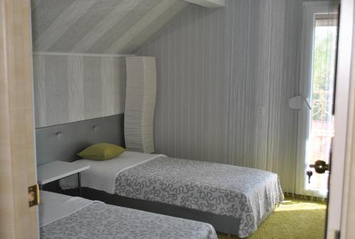 Postel nebo postele na pokoji v ubytování I love Heviz Apartments