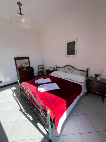 En eller flere senge i et værelse på Appartamento Orfeo