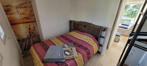 Postel nebo postele na pokoji v ubytování Mèze avec vue face à l'étang