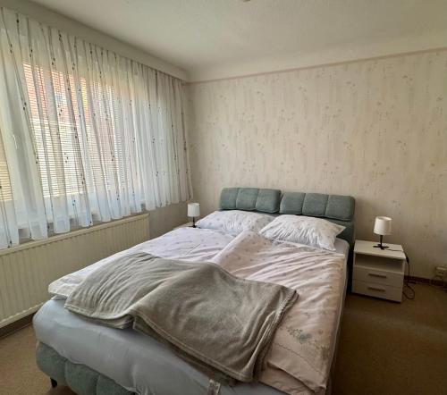 Ένα ή περισσότερα κρεβάτια σε δωμάτιο στο Wiener Melange