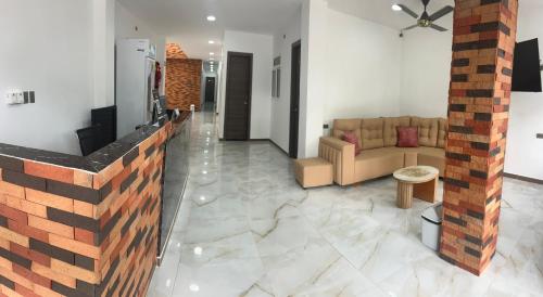Uma área de estar em Hotel Roma Urabá