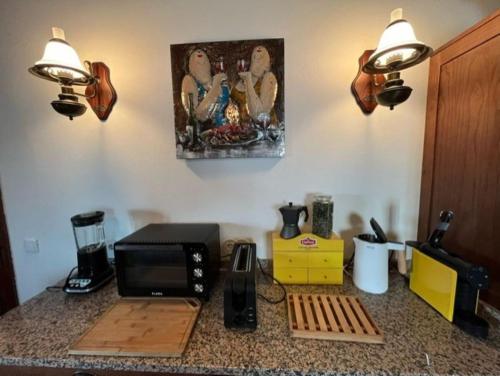 Una cocina o zona de cocina en Vila Adelaide