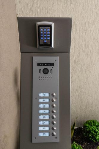 a pay phone with a control panel on it at 8 Blocks Apartments in Alexandroupoli