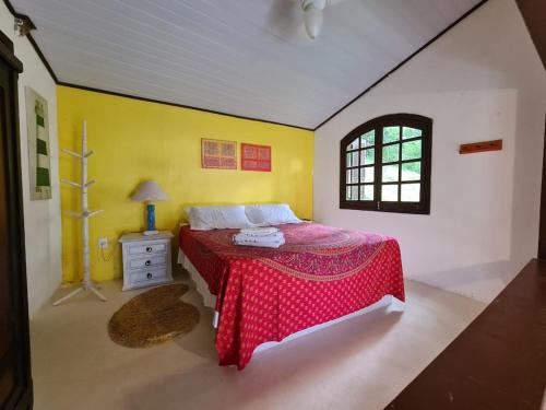 Ένα ή περισσότερα κρεβάτια σε δωμάτιο στο Linda e espetacular Casa Frente ao Mar-Praia da Aripeba-Ilha Grande