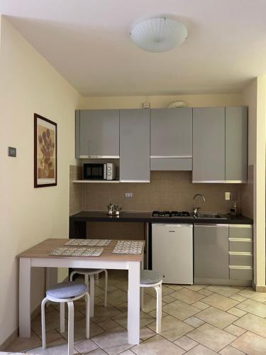 Kuchyň nebo kuchyňský kout v ubytování Studio Sole e Residenza Luna Assisi