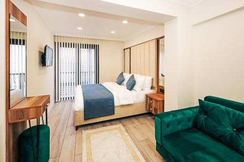 Un ou plusieurs lits dans un hébergement de l'établissement Galata Master Hotel