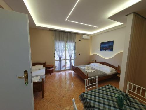 Postel nebo postele na pokoji v ubytování L&G Hotel