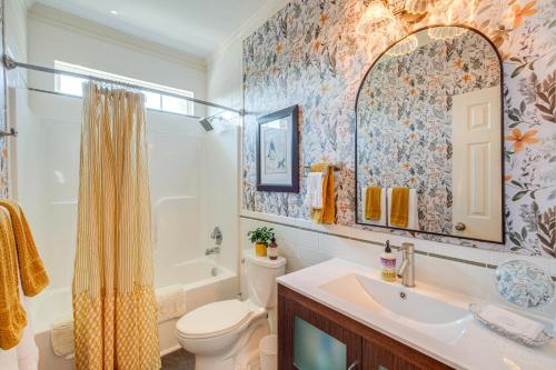 a bathroom with a sink and a toilet and a tub at Private Deck and Views Rural Virginia Escape in Gordonsville