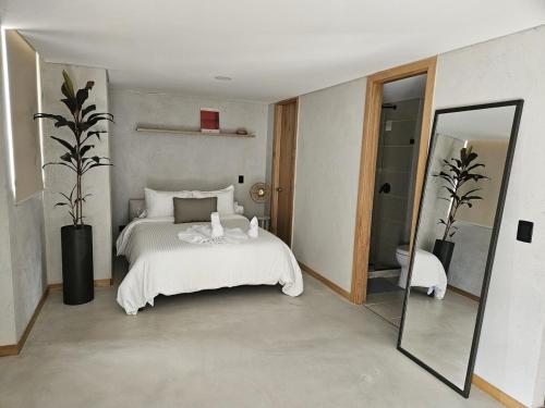 En eller flere senge i et værelse på 2402 Luxury apartment in Sabaneta