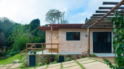Zahrada ubytování Casa na montanha, perto de Monte Verde