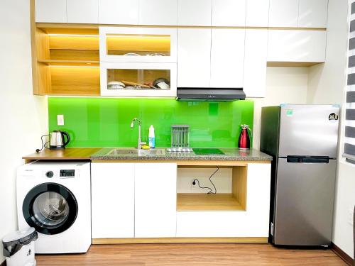 Η κουζίνα ή μικρή κουζίνα στο Vinhome Marina by HPT Homestay - Apartment Hai Phong City