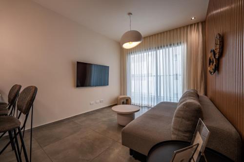 TV o dispositivi per l'intrattenimento presso Boutique Apartments - By Harim