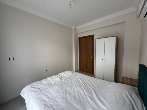 En eller flere senge i et værelse på Ege Apartments