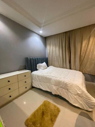 Postel nebo postele na pokoji v ubytování Tastefully Furnished four bedrooms katampe