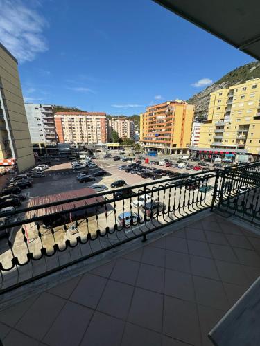 a parking lot with cars parked in a parking lot at Hotel Europa in Lezhë