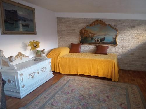 a bedroom with a bed and a mirror on the wall at buon Talenti House in Florence