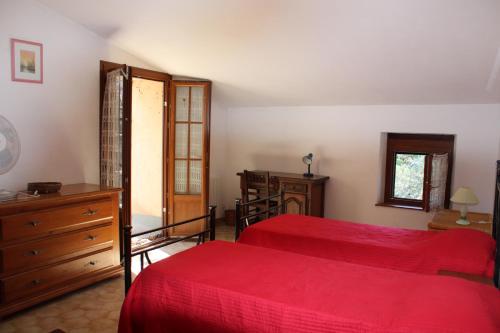 Ένα ή περισσότερα κρεβάτια σε δωμάτιο στο Mas provencal traditionnel