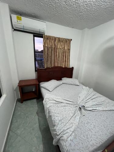 Postel nebo postele na pokoji v ubytování Hotel Mi Ranchito