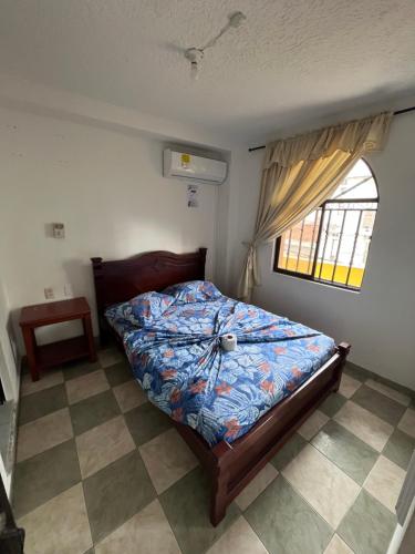 Postel nebo postele na pokoji v ubytování Hotel Mi Ranchito