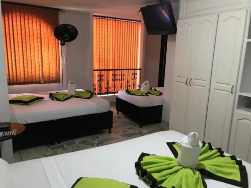 Postel nebo postele na pokoji v ubytování Hotel Astorias