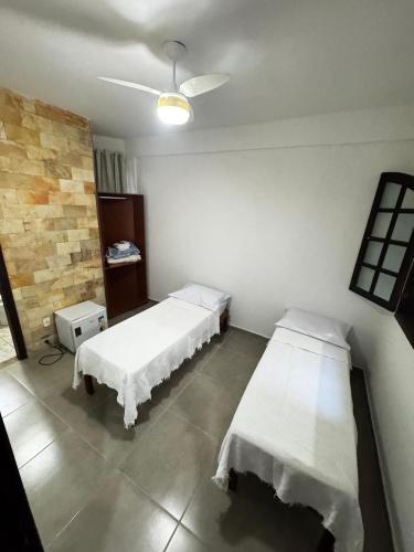 Katil atau katil-katil dalam bilik di Hotel Nossa Senhora da Conceição