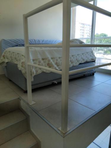 Ένα ή περισσότερα κρεβάτια σε δωμάτιο στο Duplex