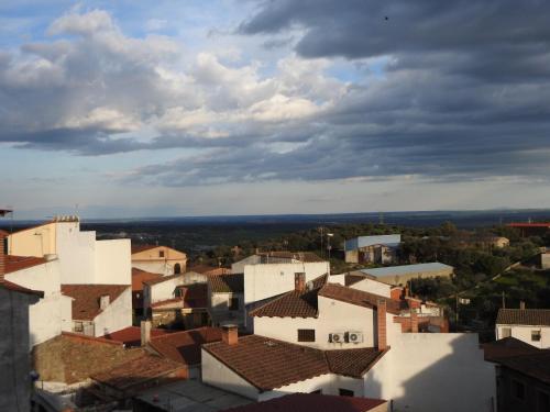 an aerial view of a city with roofs at La Posada de Bayuela in Castillo de Bayuela