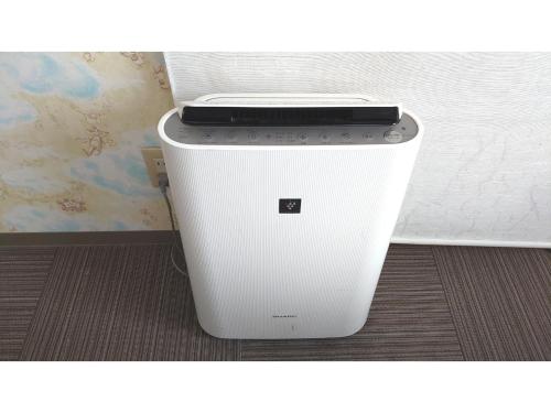 a white cpu sitting on the floor next to a wall at Kokura Recent Hotel - Vacation STAY 61113v in Kitakyushu