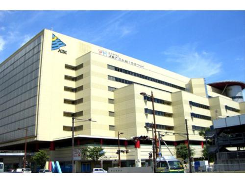 a large building with a sign on the side of it at Kokura Recent Hotel - Vacation STAY 61113v in Kitakyushu
