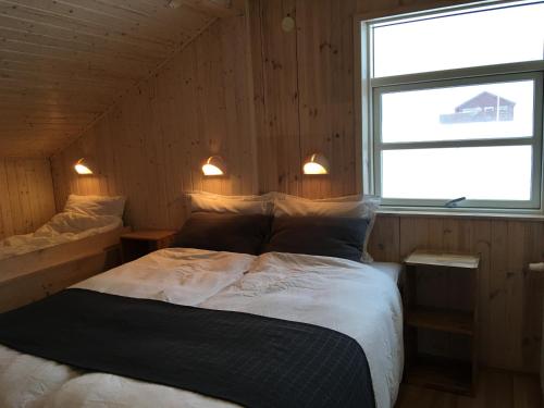 Postel nebo postele na pokoji v ubytování Aurora Vacation Homes Fagravik