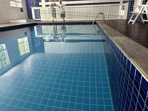 Piscina en o cerca de Bertioga, clube completo com piscina aquecida