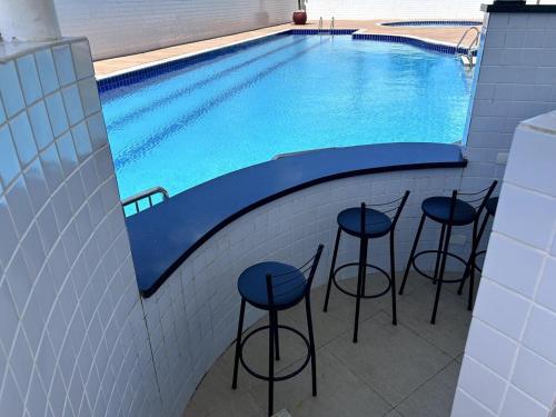 Piscina en o cerca de Bertioga, clube completo com piscina aquecida