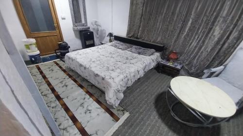 Postel nebo postele na pokoji v ubytování Mount lareen cottage كوخ جبل لارين