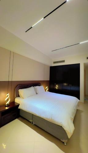 Ένα ή περισσότερα κρεβάτια σε δωμάτιο στο شقة خاصة