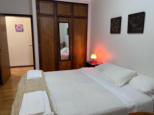 Ένα ή περισσότερα κρεβάτια σε δωμάτιο στο Azores Ocean View Apartment
