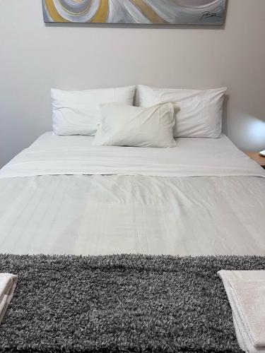 Ένα ή περισσότερα κρεβάτια σε δωμάτιο στο Azores Ocean View Apartment