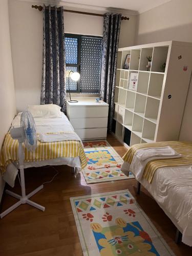 Ένα ή περισσότερα κρεβάτια σε δωμάτιο στο Azores Ocean View Apartment