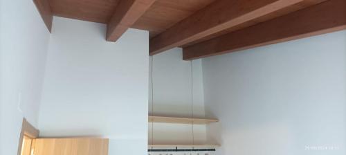 a kitchen with a glass hood over a stove at Casa Chumpón in La Puebla de Roda