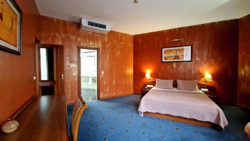 Katil atau katil-katil dalam bilik di Ararat Hotel