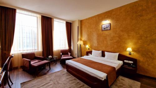 Katil atau katil-katil dalam bilik di Ararat Hotel