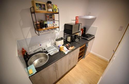 an overhead view of a kitchen with a sink at 13 Matheson Place in Portree