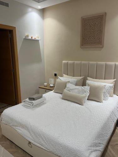 Postel nebo postele na pokoji v ubytování Appartement le vizir center