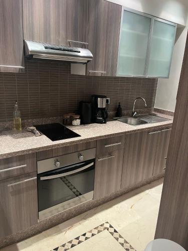 Kuchyň nebo kuchyňský kout v ubytování Appartement le vizir center