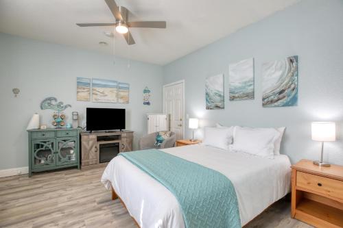 a bedroom with a bed and a flat screen tv at Pacific Plaza #505 - Coastal Gem - StudioD-Q in Oceano