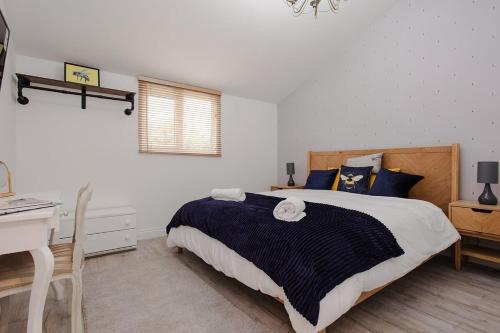 Voodi või voodid majutusasutuse Hunny Cottage - Ryde toas