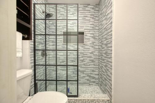 a shower with a glass door in a bathroom at Pacific Plaza #308 - Lazy Dune - 1BdrmUp-K-QSofa in Oceano