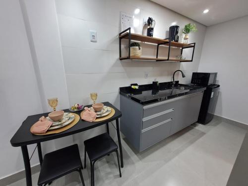 Η κουζίνα ή μικρή κουζίνα στο Lofts Indaiatuba