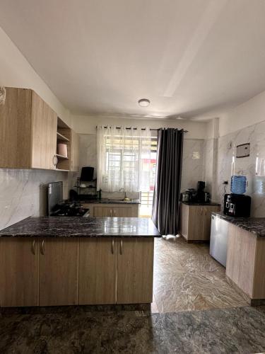 Η κουζίνα ή μικρή κουζίνα στο Ruaka 407